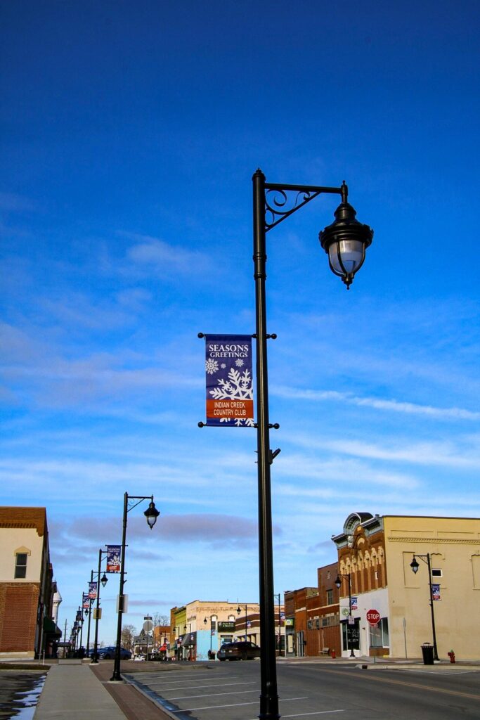 Light Pole with holiday season greetings banner on main street